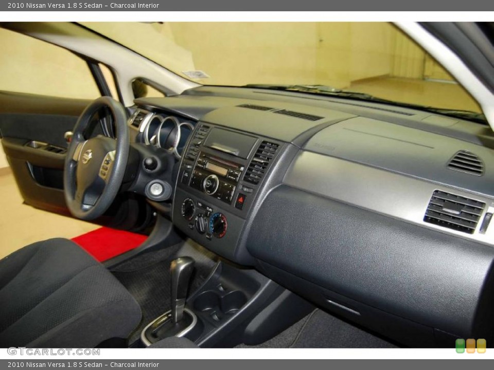 Charcoal Interior Dashboard for the 2010 Nissan Versa 1.8 S Sedan #38695622