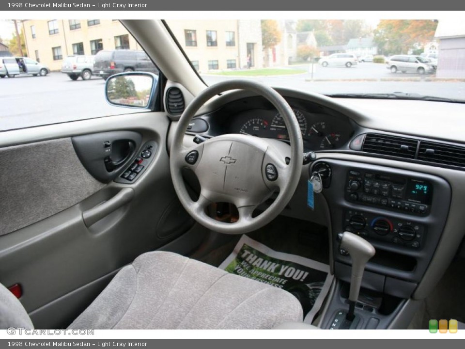 Light Gray Interior Controls for the 1998 Chevrolet Malibu Sedan #38698655