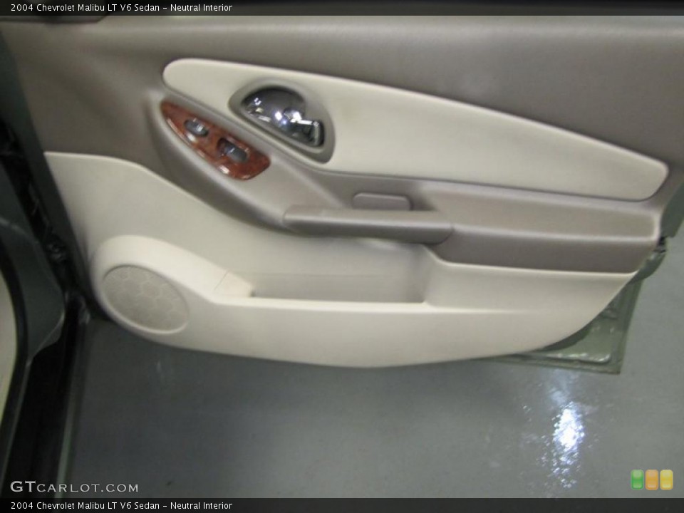 Neutral Interior Door Panel for the 2004 Chevrolet Malibu LT V6 Sedan #38703611