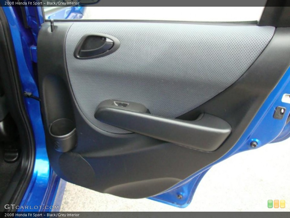 Black/Grey Interior Door Panel for the 2008 Honda Fit Sport #38717807