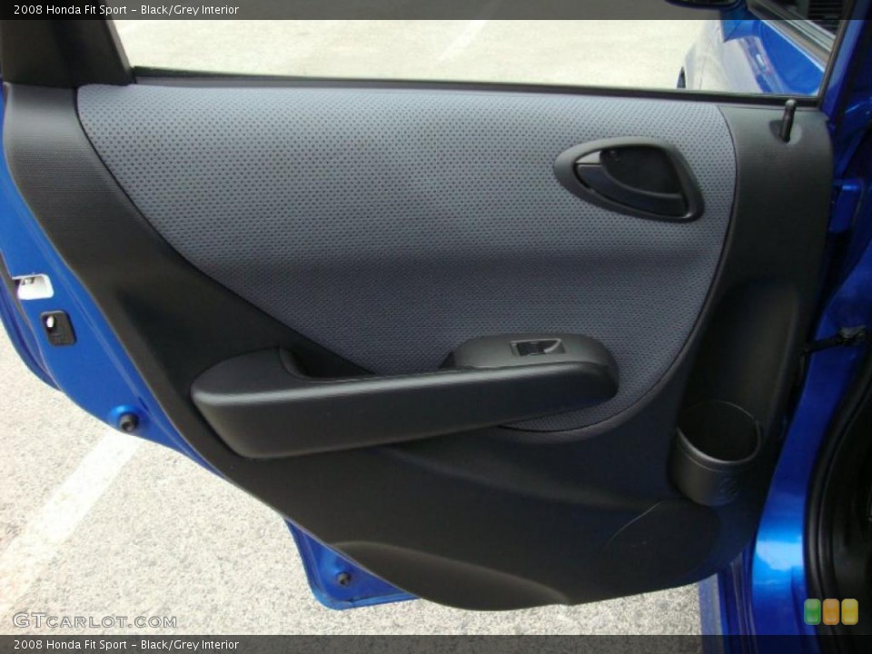 Black/Grey Interior Door Panel for the 2008 Honda Fit Sport #38717839