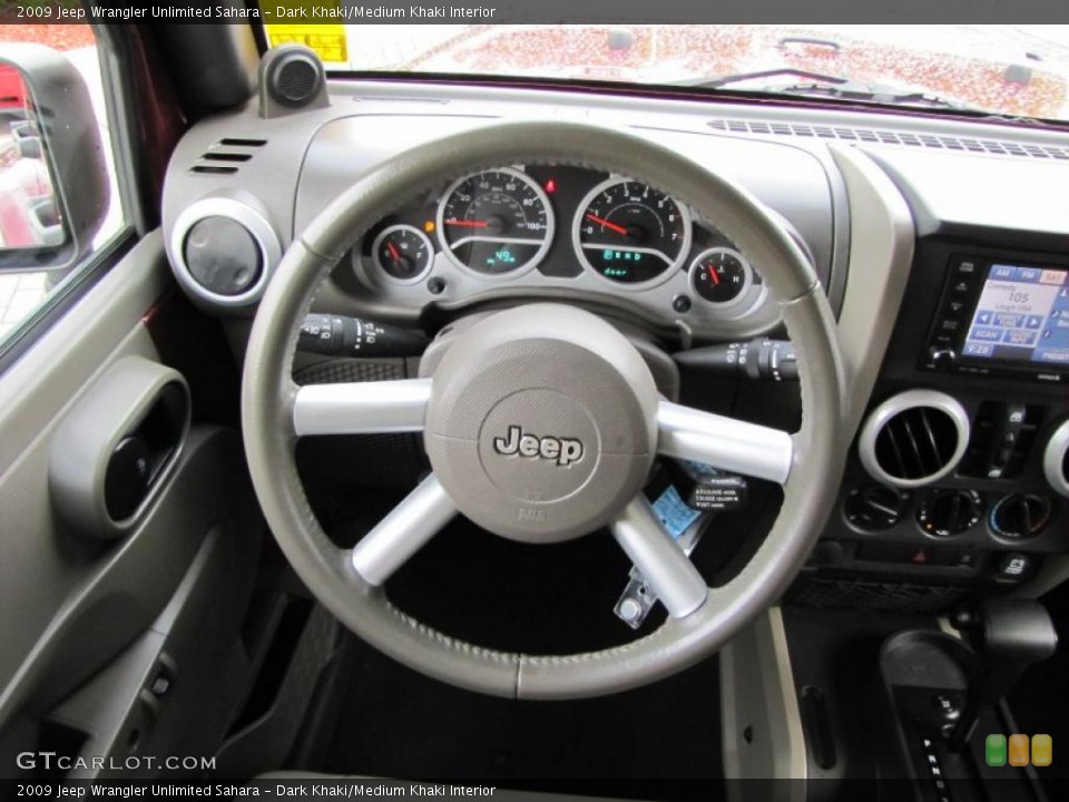 Dark Khaki/Medium Khaki Interior Steering Wheel for the 2009 Jeep Wrangler Unlimited Sahara #38718727