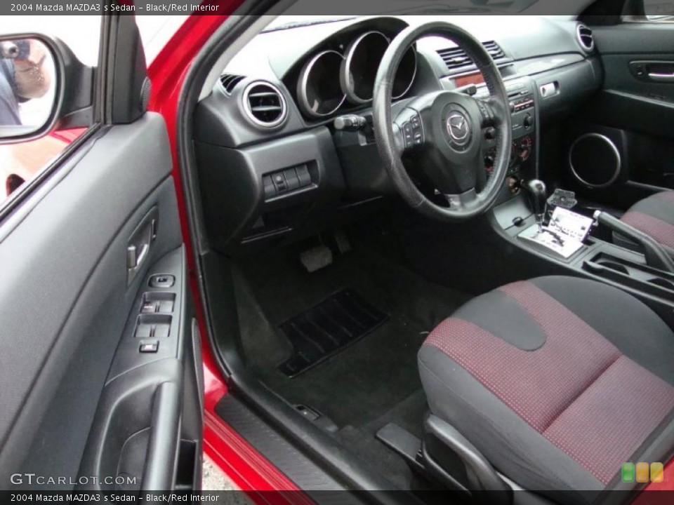 Black/Red Interior Prime Interior for the 2004 Mazda MAZDA3 s Sedan #38720091