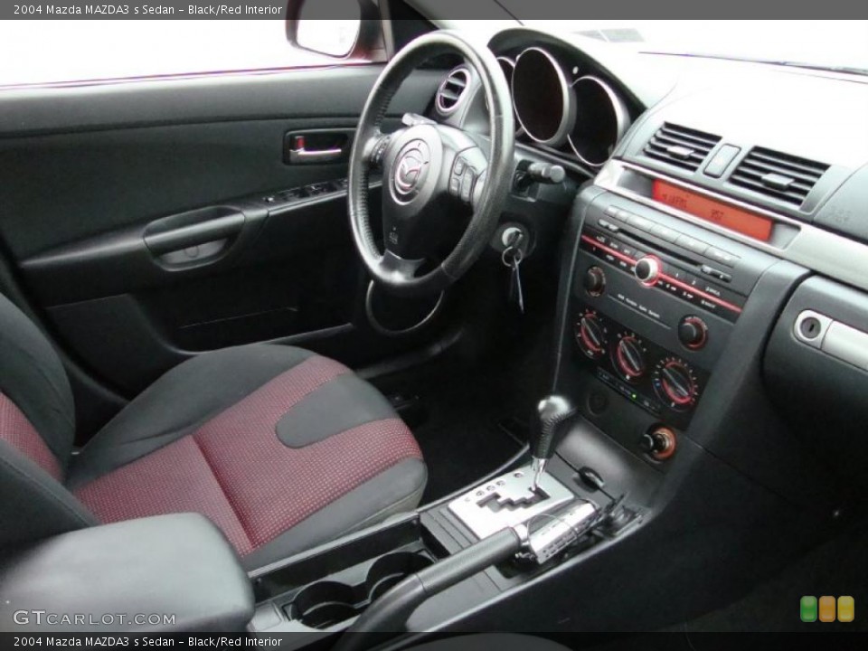 Black/Red Interior Photo for the 2004 Mazda MAZDA3 s Sedan #38720191