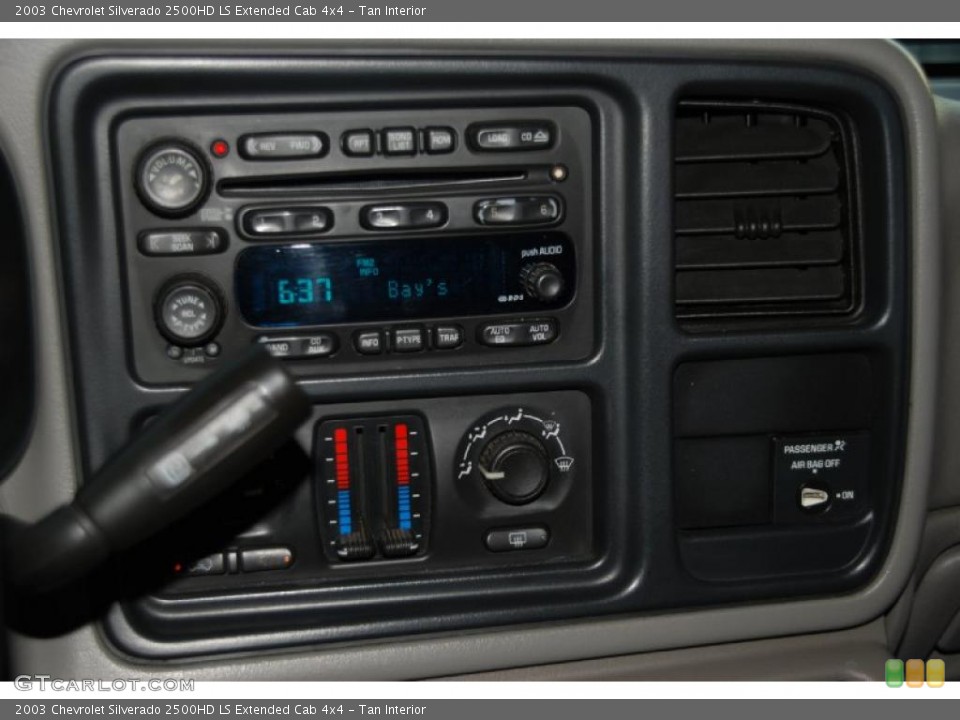 Tan Interior Controls for the 2003 Chevrolet Silverado 2500HD LS Extended Cab 4x4 #38722339