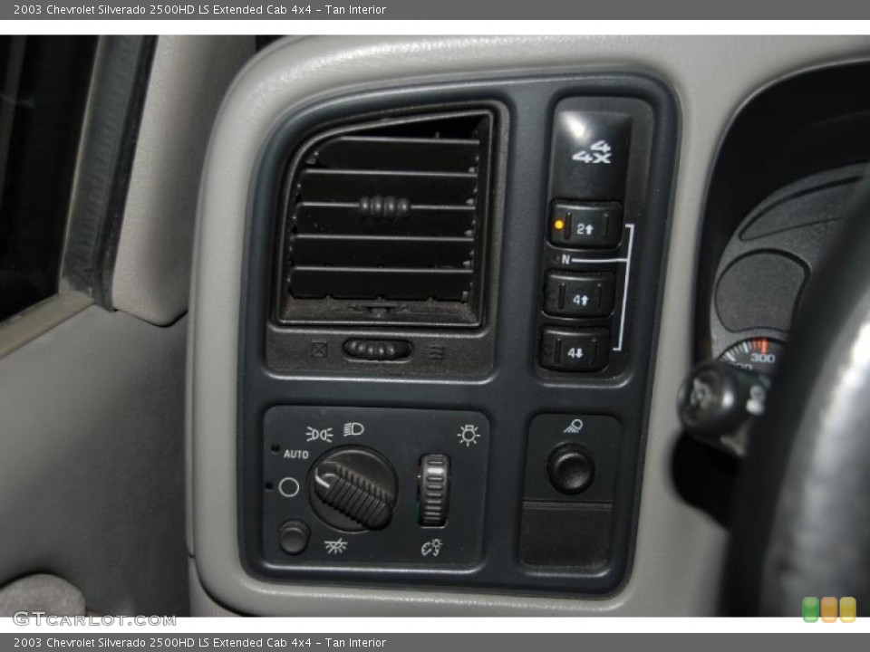 Tan Interior Controls for the 2003 Chevrolet Silverado 2500HD LS Extended Cab 4x4 #38722371