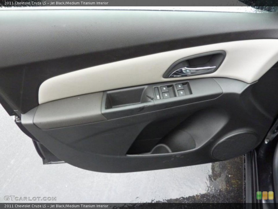 Jet Black/Medium Titanium Interior Door Panel for the 2011 Chevrolet Cruze LS #38732535