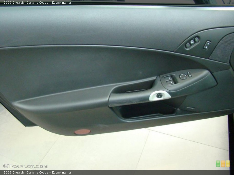 Ebony Interior Door Panel for the 2009 Chevrolet Corvette Coupe #38749844