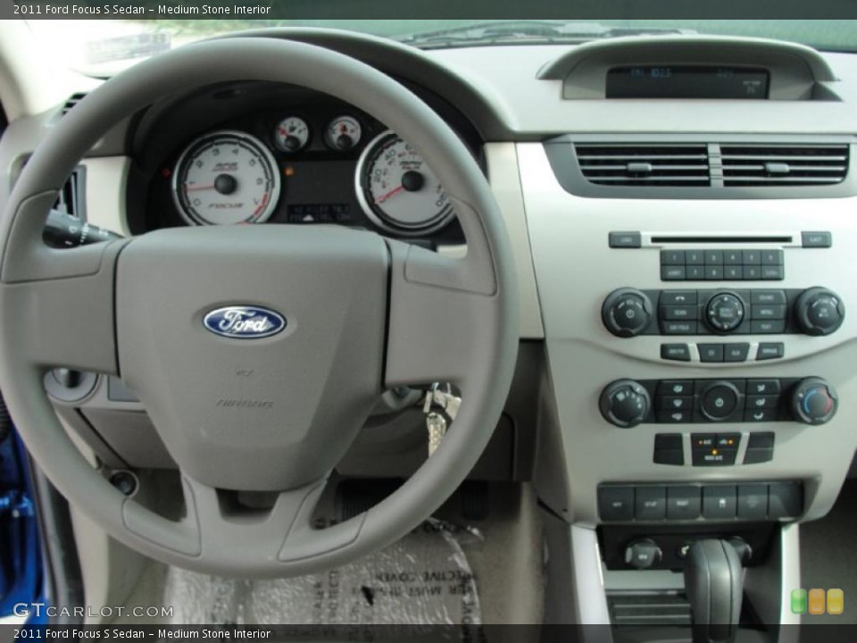 Medium Stone Interior Dashboard for the 2011 Ford Focus S Sedan #38754608