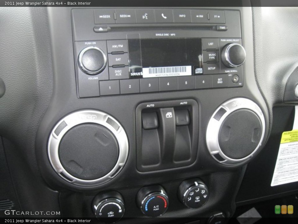 Black Interior Controls for the 2011 Jeep Wrangler Sahara 4x4 #38789426