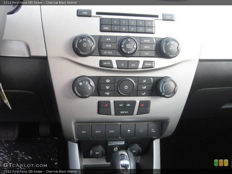 Charcoal Black Interior Controls for the 2011 Ford Focus SES Sedan #38789994