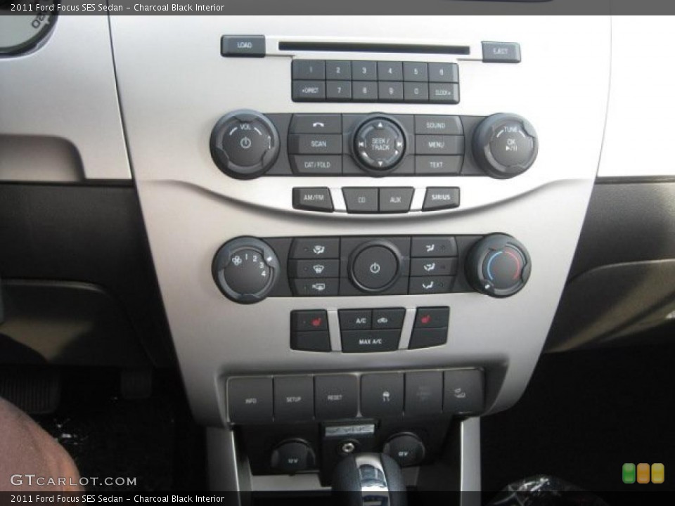 Charcoal Black Interior Controls for the 2011 Ford Focus SES Sedan #38790078