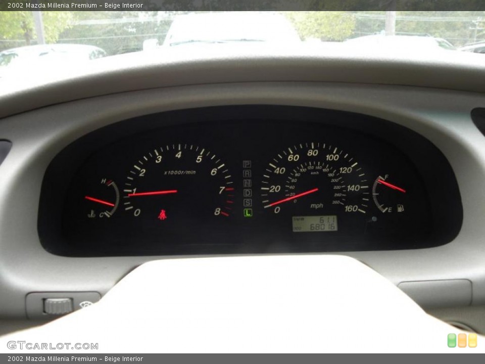 Beige Interior Gauges for the 2002 Mazda Millenia Premium #38798007
