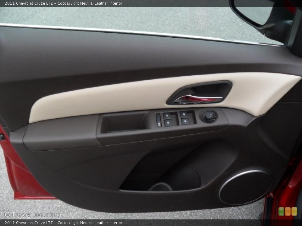 Cocoa/Light Neutral Leather Interior Door Panel for the 2011 Chevrolet Cruze LTZ #38811440