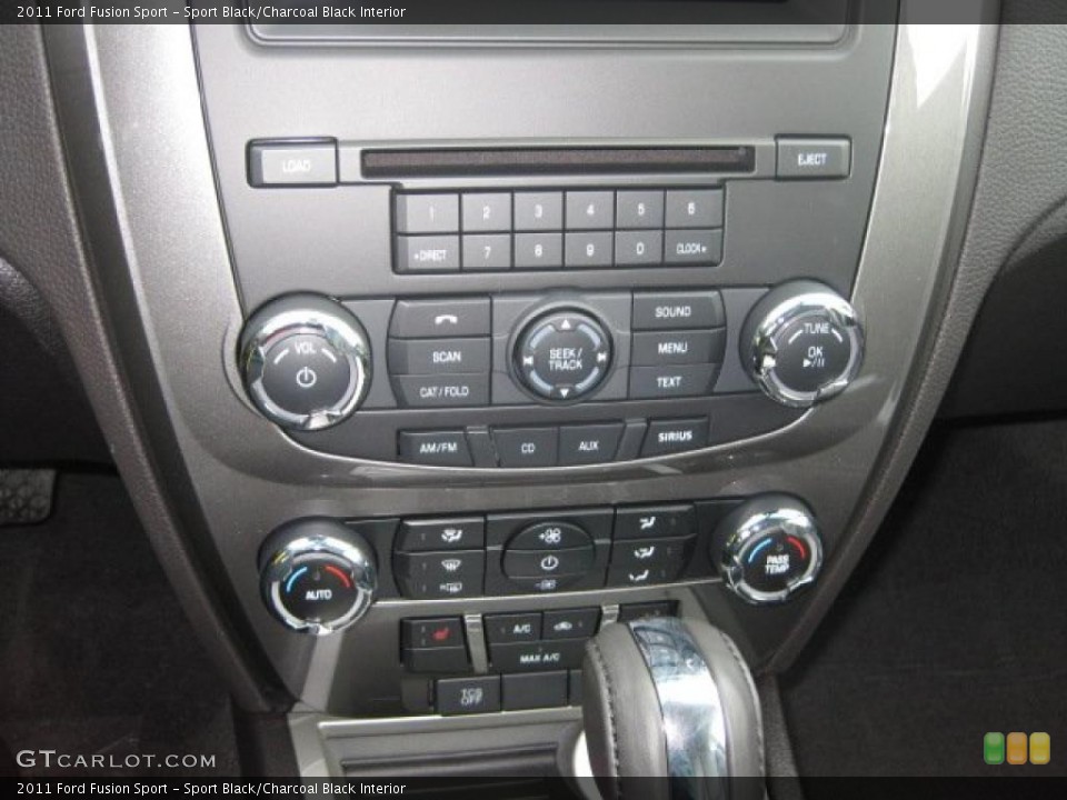 Sport Black/Charcoal Black Interior Controls for the 2011 Ford Fusion Sport #38814488