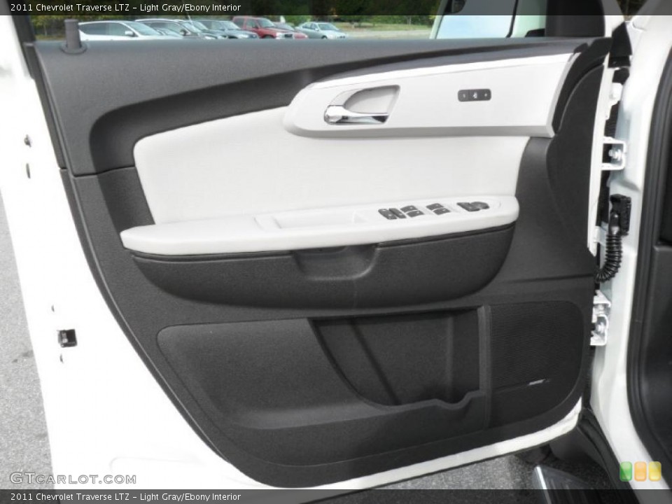 Light Gray/Ebony Interior Door Panel for the 2011 Chevrolet Traverse LTZ #38822456