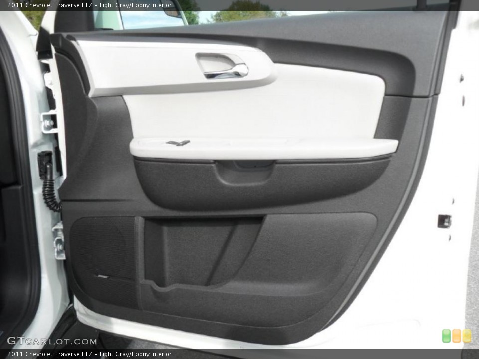 Light Gray/Ebony Interior Door Panel for the 2011 Chevrolet Traverse LTZ #38823132