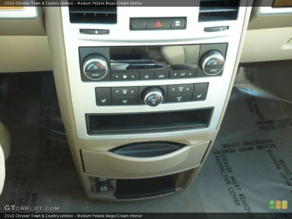 Medium Pebble Beige/Cream Interior Controls for the 2010 Chrysler Town & Country Limited #38828392