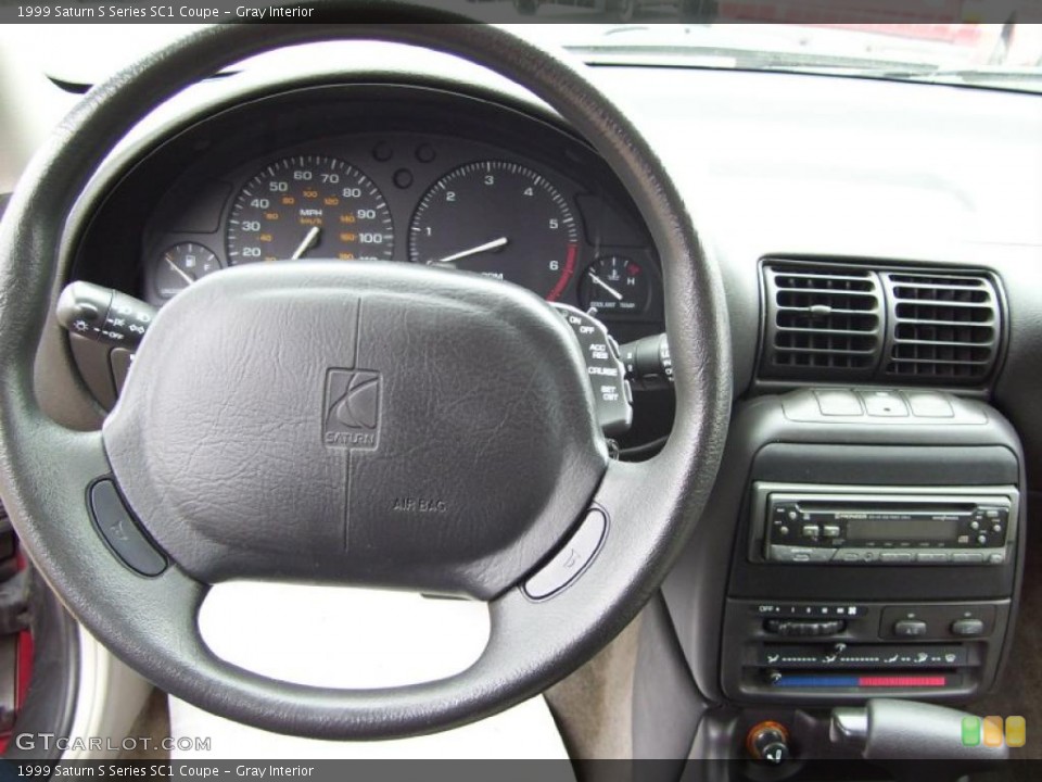 Gray Interior Dashboard for the 1999 Saturn S Series SC1 Coupe #38841284