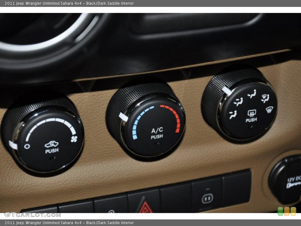 Black/Dark Saddle Interior Controls for the 2011 Jeep Wrangler Unlimited Sahara 4x4 #38859348