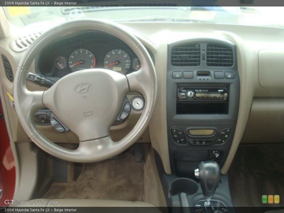 Beige Interior Dashboard for the 2004 Hyundai Santa Fe LX #38864692