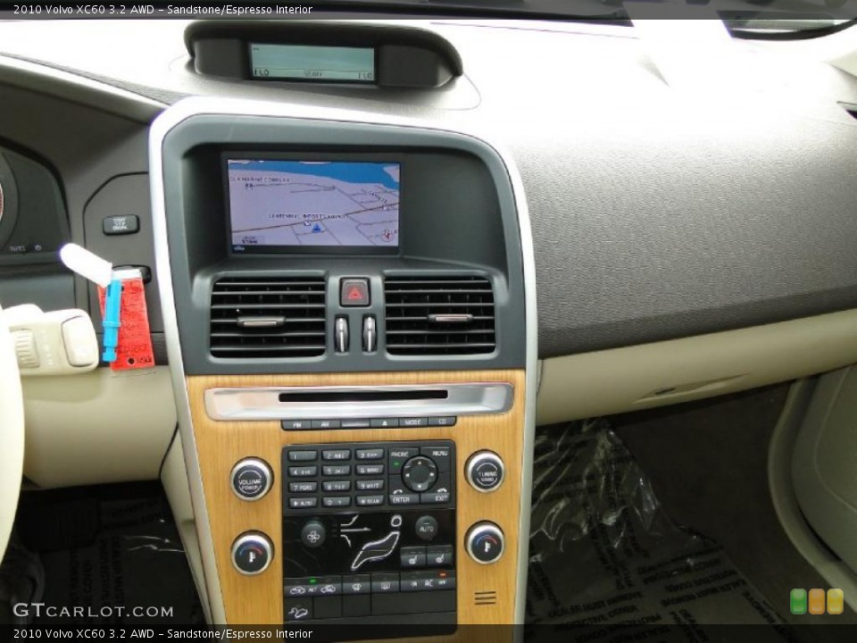 Sandstone/Espresso Interior Controls for the 2010 Volvo XC60 3.2 AWD #38891098