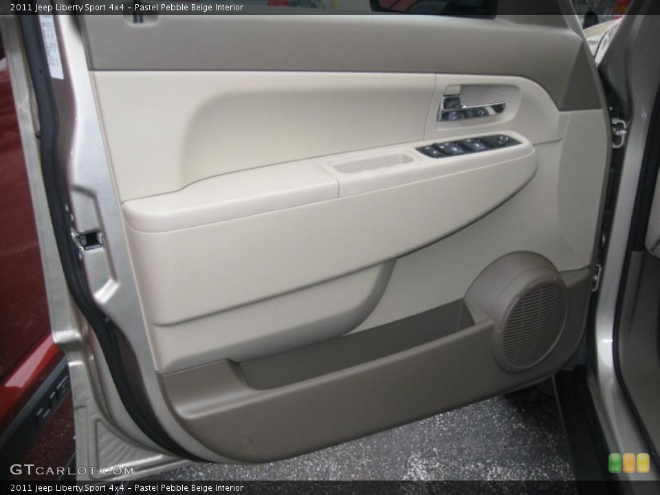 Pastel Pebble Beige Interior Door Panel for the 2011 Jeep Liberty Sport 4x4 #38900338