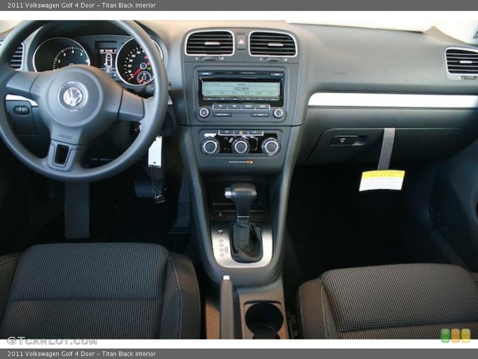 Titan Black Interior Dashboard for the 2011 Volkswagen Golf 4 Door #38900542