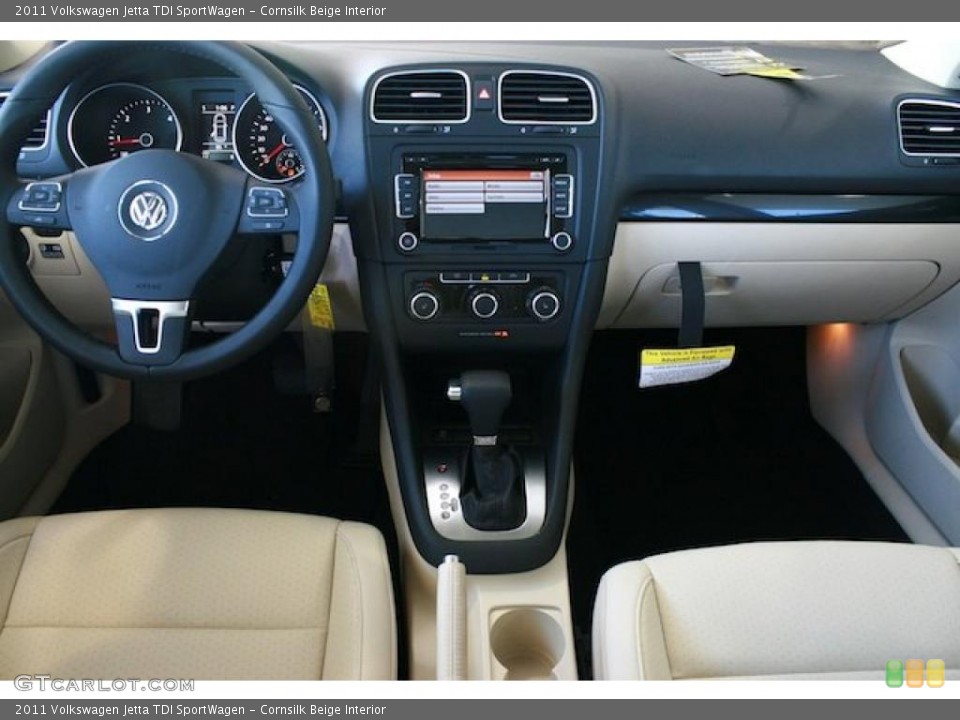 Cornsilk Beige Interior Dashboard for the 2011 Volkswagen Jetta TDI SportWagen #38902134