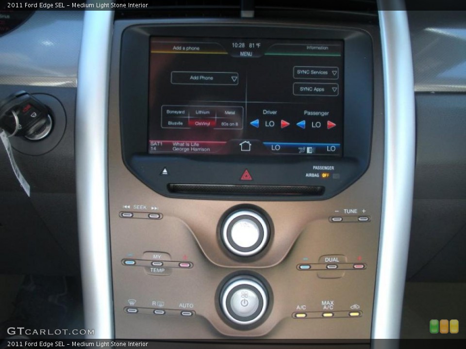 Medium Light Stone Interior Controls for the 2011 Ford Edge SEL #38908762