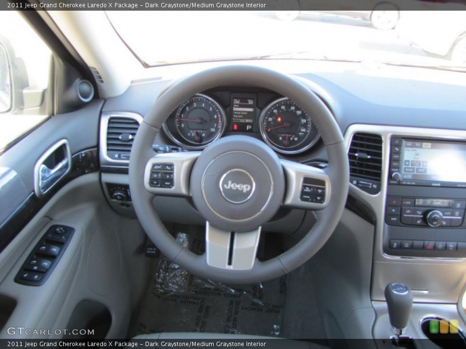 Dark Graystone/Medium Graystone Interior Steering Wheel for the 2011 Jeep Grand Cherokee Laredo X Package #38918614