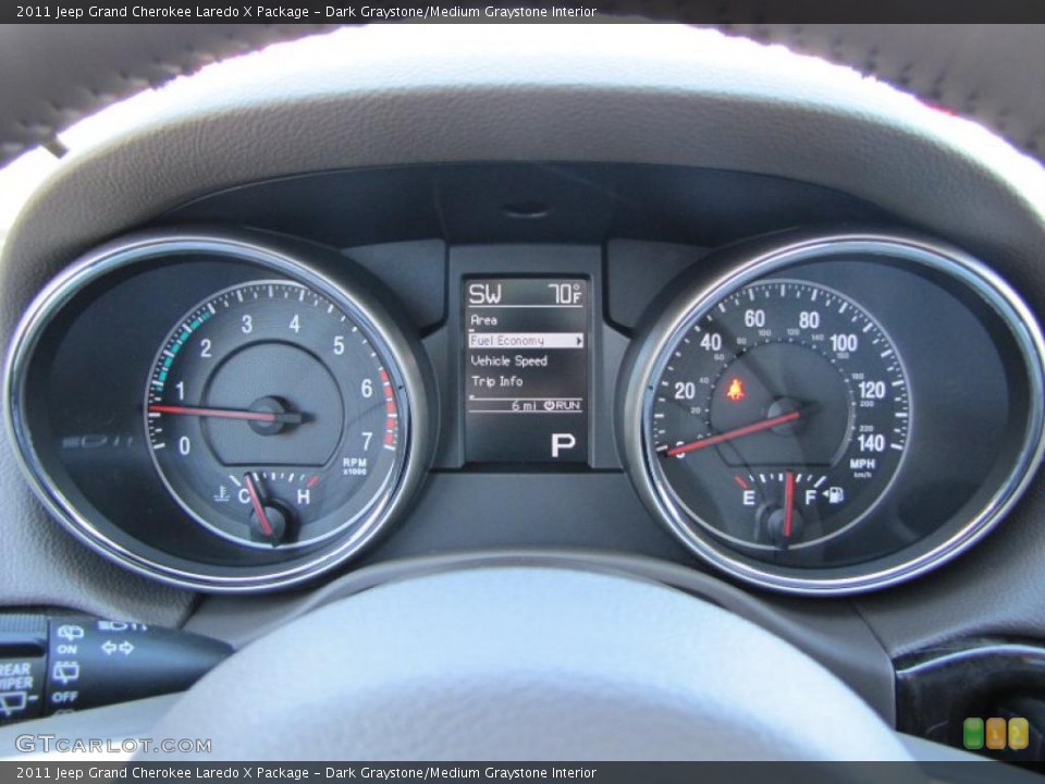 Dark Graystone/Medium Graystone Interior Gauges for the 2011 Jeep Grand Cherokee Laredo X Package #38918646