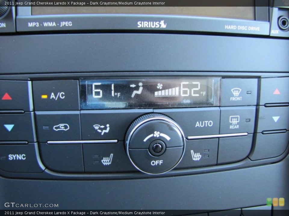 Dark Graystone/Medium Graystone Interior Controls for the 2011 Jeep Grand Cherokee Laredo X Package #38918678