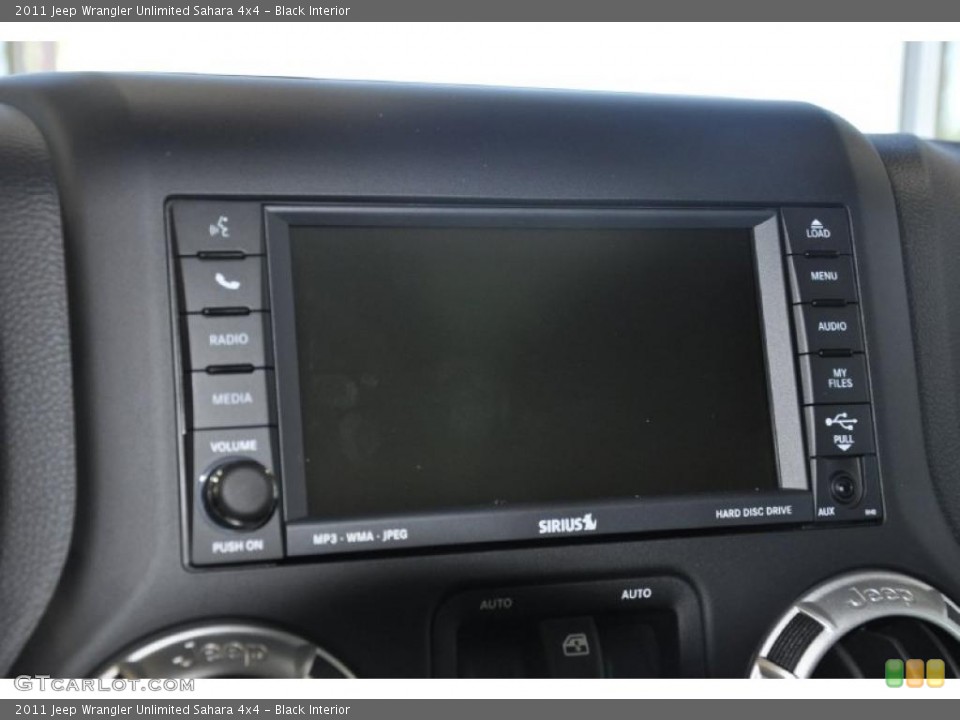 Black Interior Controls for the 2011 Jeep Wrangler Unlimited Sahara 4x4 #38923026