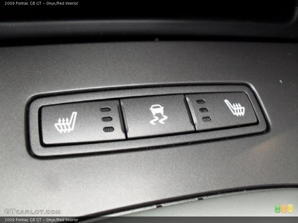 Onyx/Red Interior Controls for the 2009 Pontiac G8 GT #38928818