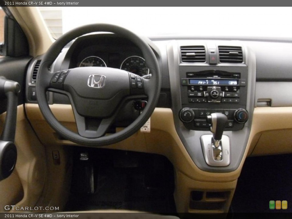 Ivory Interior Dashboard for the 2011 Honda CR-V SE 4WD #38932994