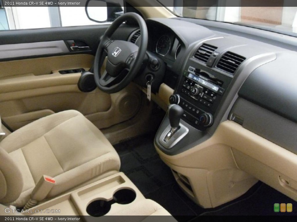 Ivory Interior Dashboard for the 2011 Honda CR-V SE 4WD #38933098