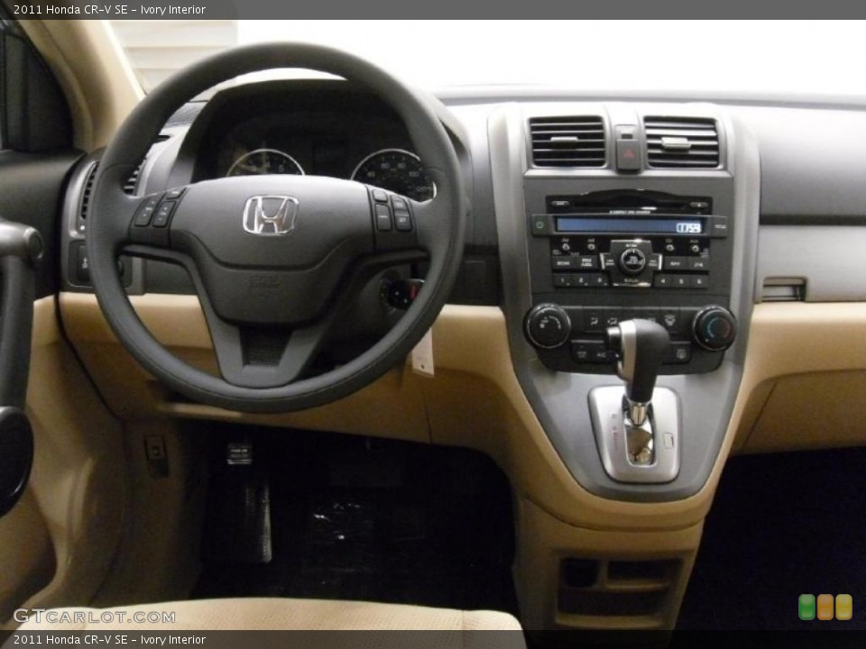 Ivory Interior Dashboard for the 2011 Honda CR-V SE #38933978