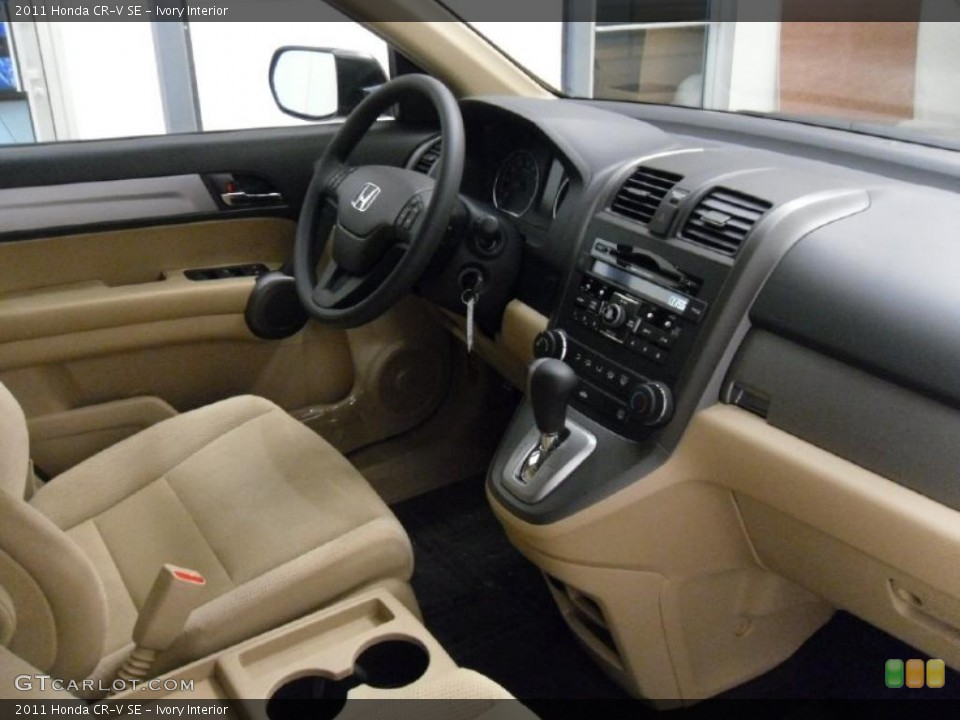Ivory Interior Dashboard for the 2011 Honda CR-V SE #38934070