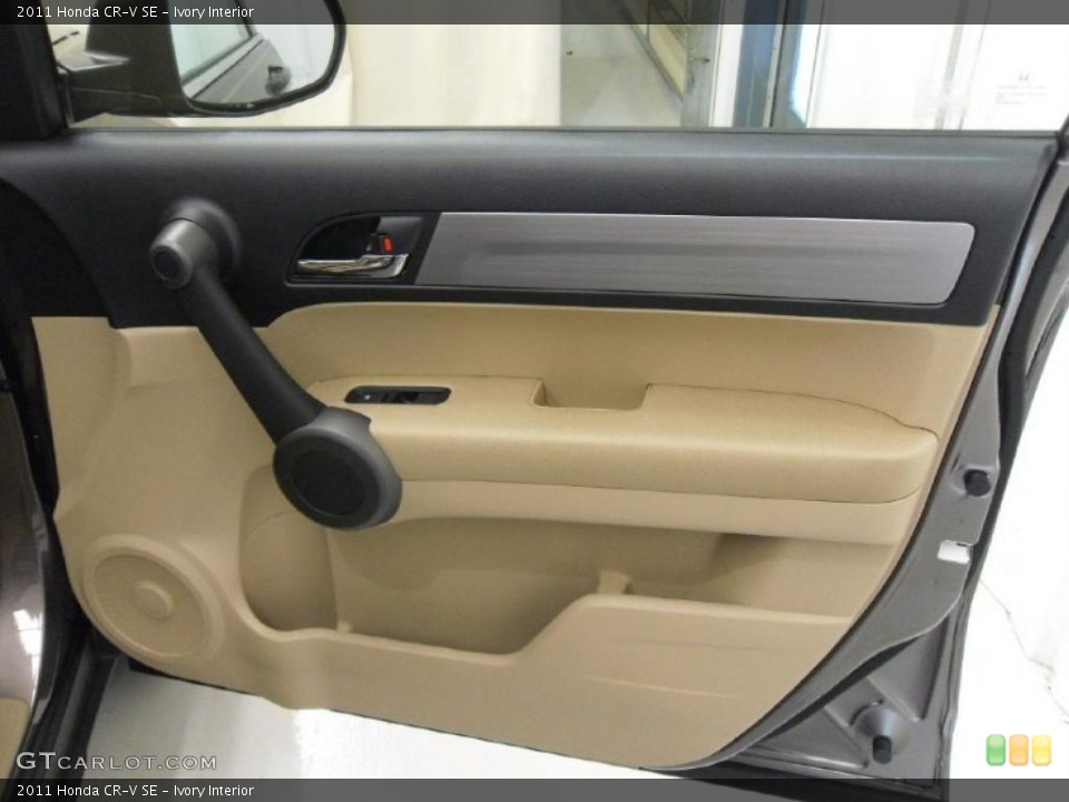 Ivory Interior Door Panel for the 2011 Honda CR-V SE #38934094