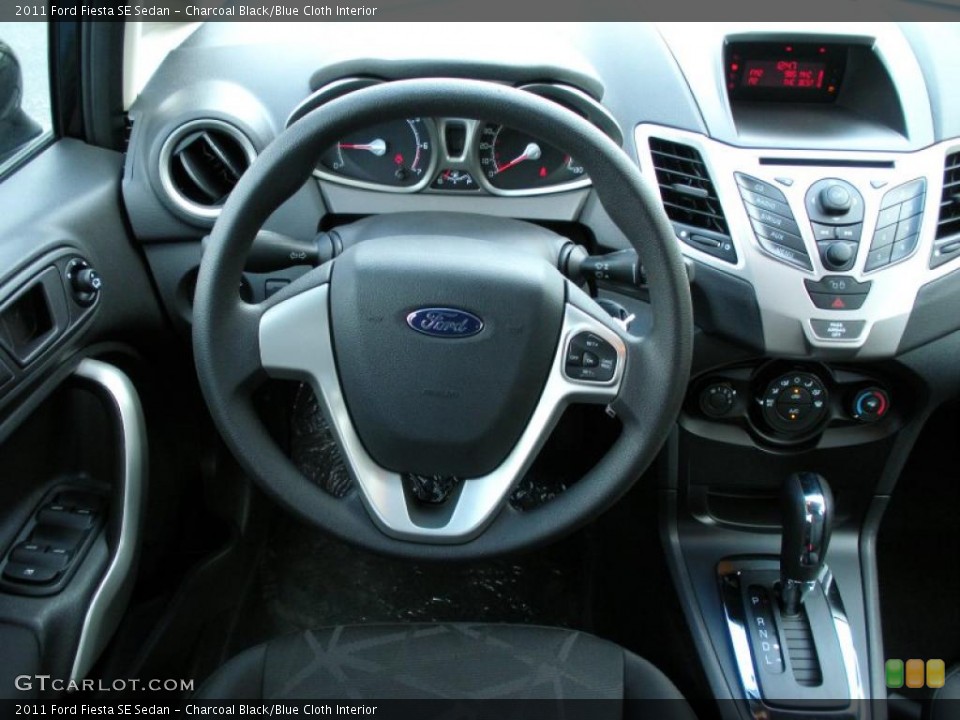 Charcoal Black/Blue Cloth Interior Steering Wheel for the 2011 Ford Fiesta SE Sedan #38935714