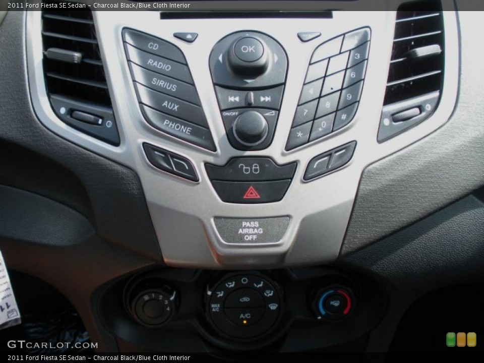 Charcoal Black/Blue Cloth Interior Controls for the 2011 Ford Fiesta SE Sedan #38935946