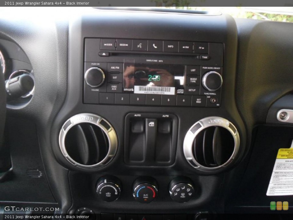 Black Interior Controls for the 2011 Jeep Wrangler Sahara 4x4 #38938682