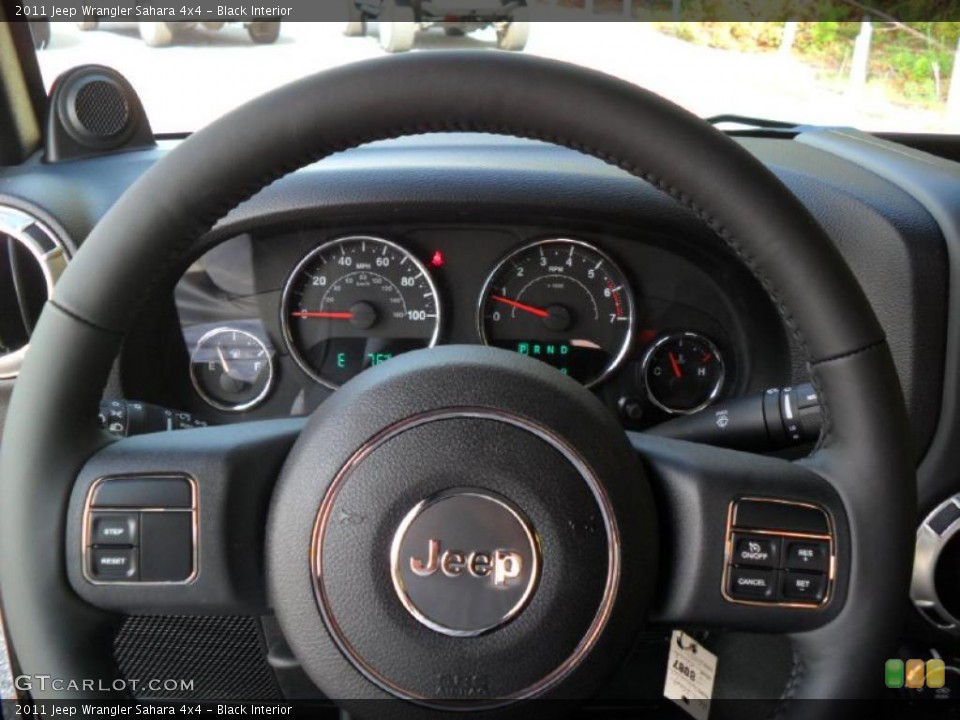 Black Interior Steering Wheel for the 2011 Jeep Wrangler Sahara 4x4 #38938698
