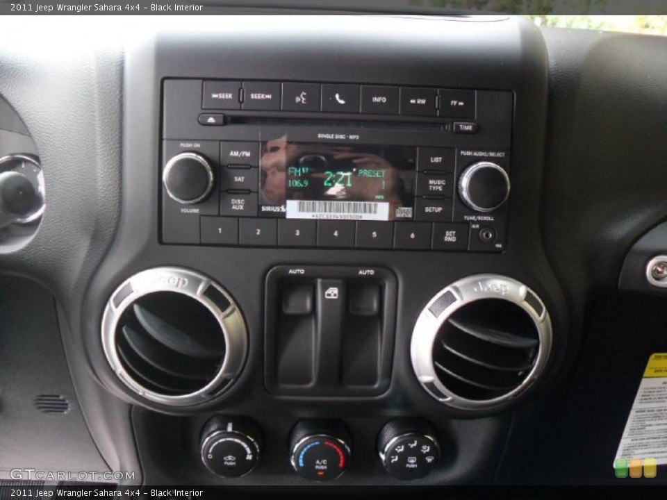 Black Interior Controls for the 2011 Jeep Wrangler Sahara 4x4 #38939062