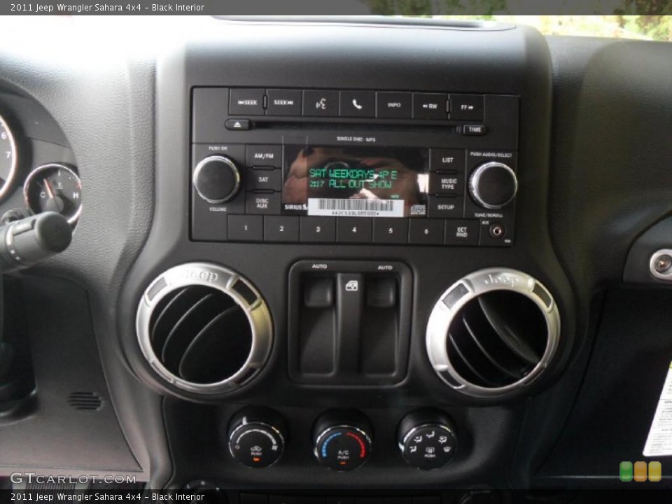 Black Interior Controls for the 2011 Jeep Wrangler Sahara 4x4 #38939454