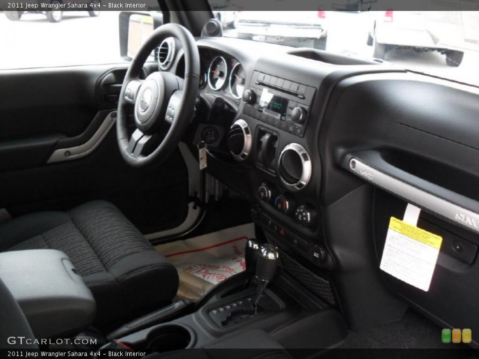 Black Interior Dashboard for the 2011 Jeep Wrangler Sahara 4x4 #38939506