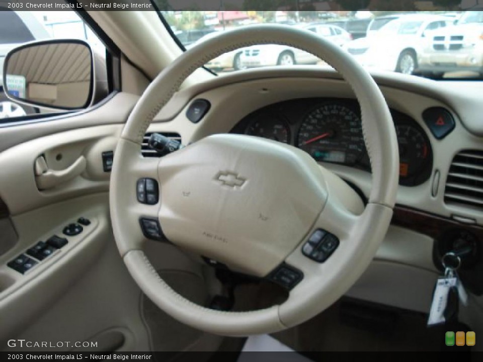 Neutral Beige Interior Steering Wheel for the 2003 Chevrolet Impala LS #38999362