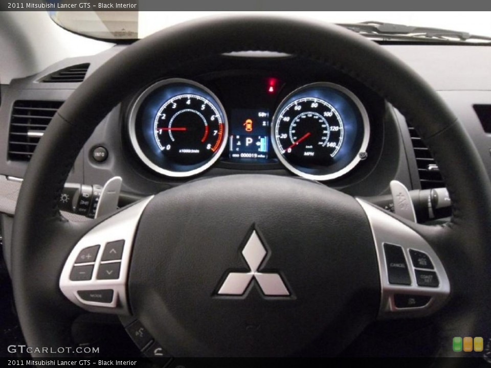 Black Interior Steering Wheel for the 2011 Mitsubishi Lancer GTS #39015595