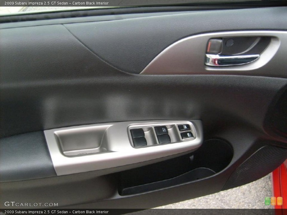 Carbon Black Interior Door Panel for the 2009 Subaru Impreza 2.5 GT Sedan #39018395
